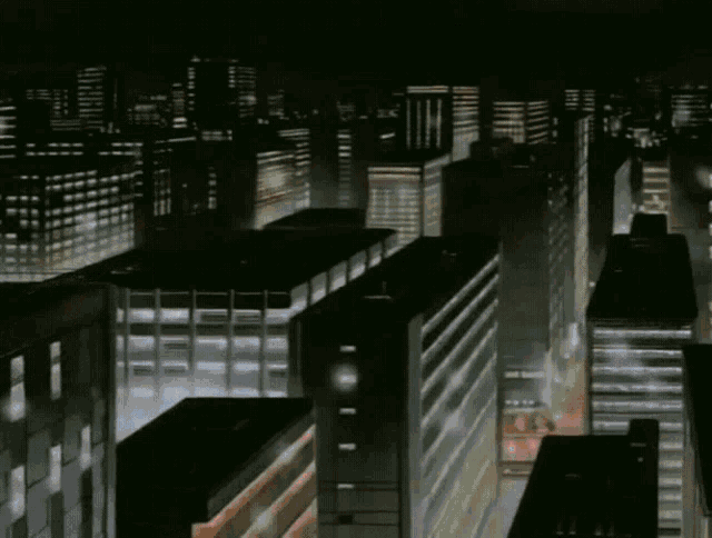 a person is holding two glasses of red wine in front of a city skyline