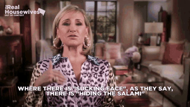 a woman in a leopard print shirt is talking about hiding the salami