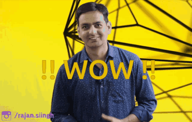 a man in a blue shirt stands in front of a yellow background with the words wow written on it