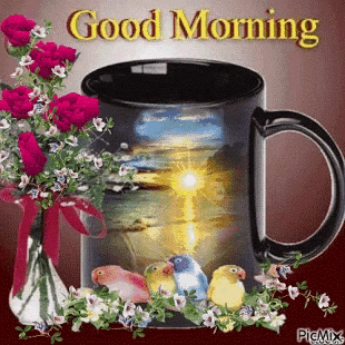 a mug with flowers and birds on it and the words good morning written above it