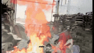 a video game scene with a motorcycle on fire