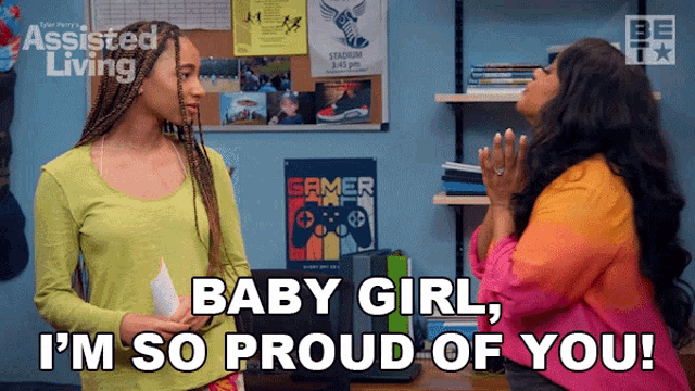 two women standing next to each other with the words baby girl i 'm so proud of you on the bottom