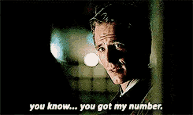 a man in a suit and tie is smiling and saying `` you know ... you got my number . ''