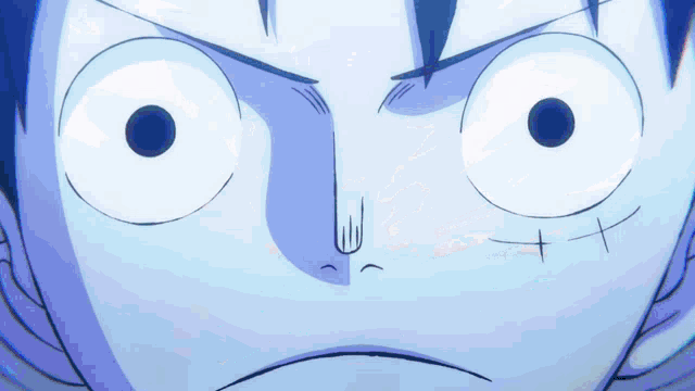 a close up of a person 's face with a cross on it