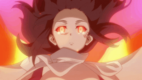 a close up of a girl 's face with red eyes