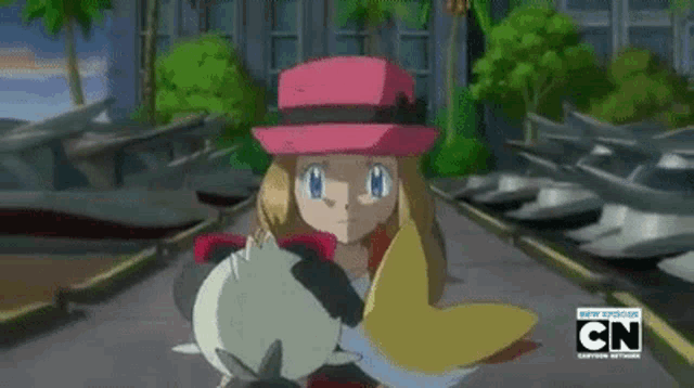 a girl in a pink hat is holding a chicken in a cartoon .