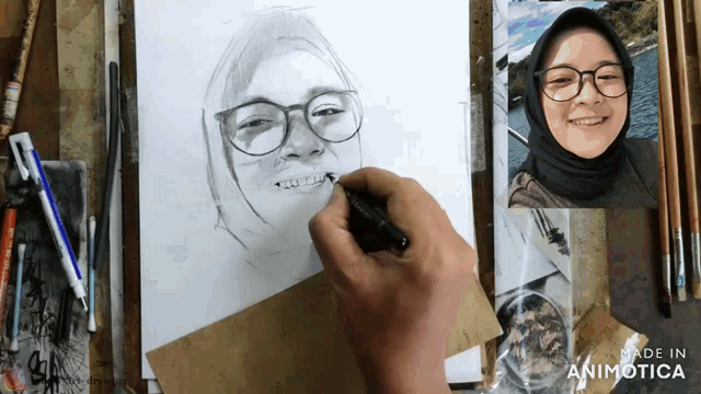 a drawing of a woman with glasses and a hijab is being made in animatica