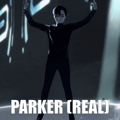 a man in a black suit is standing with his arms outstretched in front of a sign that says " parker creal "