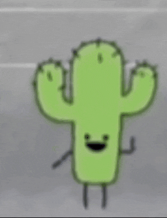 a green cactus with arms and legs and a smiling face is standing on a street .