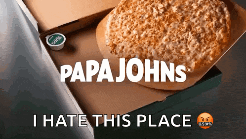 a papa johns pizza is in a box next to a dipping sauce container
