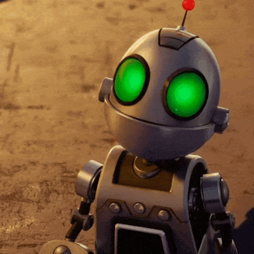 a cartoon robot with green eyes and a red top