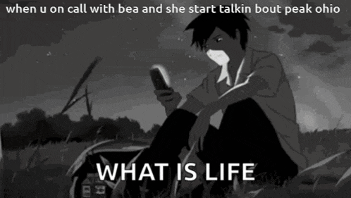 a man is sitting in the grass looking at his phone with the words " what is life " below him