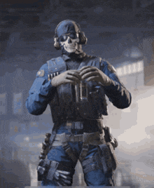 a soldier with a skull mask on is holding a bottle of beer .