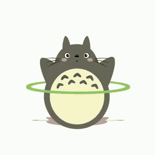 a cartoon totoro is hula hooping with a green hula hoop .