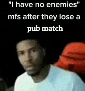 a man is standing in front of a sign that says `` i have no enemies mfs after they lose a pub match ''