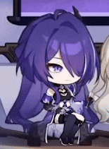 a girl with purple hair is sitting on a couch next to another girl .