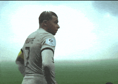 a man wearing a number 7 jersey stands on a field