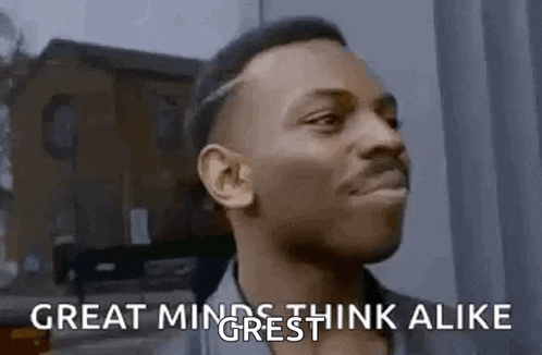 a man is making a funny face and saying `` great minds think alike `` .