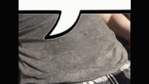 a close up of a person 's stomach with a speech bubble above it