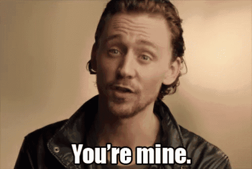 a man wearing a leather jacket says you 're mine