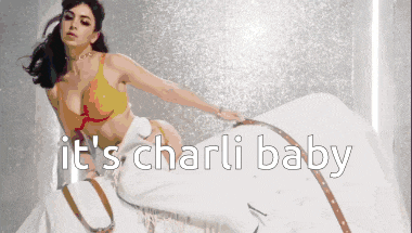 a picture of a woman with the words " it 's charli baby " below her