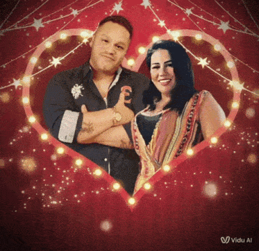 a man and a woman are standing in a heart shaped frame with a red background