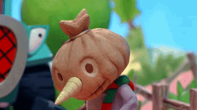 a cartoon character with a bag on his head and a horn on his nose
