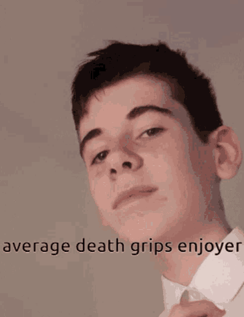 a young man with his eyes closed and the words average death grips enjoyed