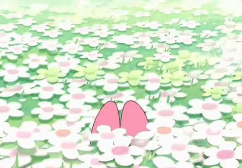 a pink bunny with a flower on her head is standing in a field of white flowers .