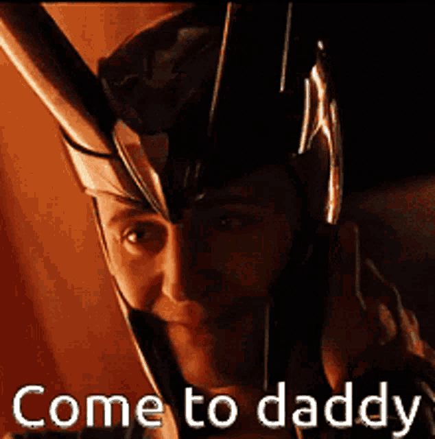 a man wearing a helmet with the words come to daddy below him
