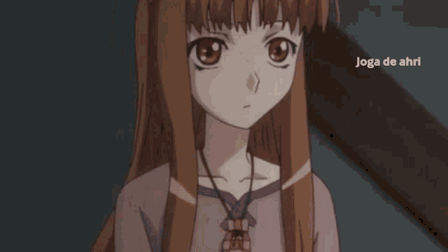 a girl with her eyes closed is being touched by a hand with the words joga de ahri below her