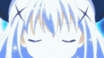 a close up of a girl 's face with closed eyes