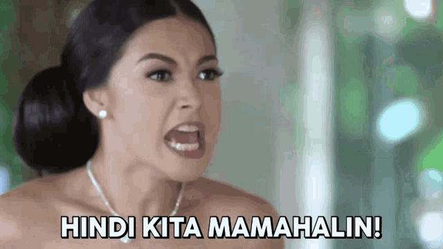 a woman with her mouth open and the words hindi kita mamahalain