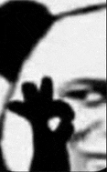 a black and white photo of a person making a thumbs up sign .