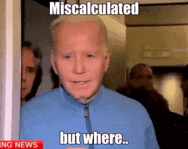 a man in a blue jacket says miscalculated but where in front of a breaking news sign