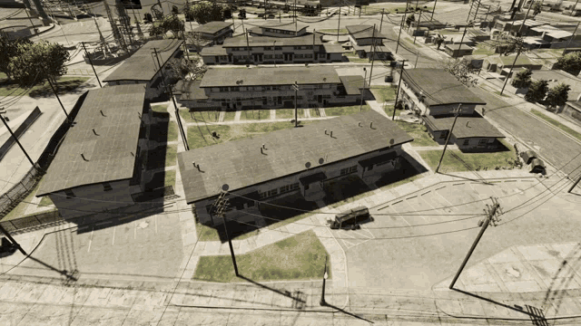 an aerial view of a row of apartment buildings with the letter l on the roofs