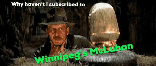 an ad for winnipeg 's mcluhan features a man in a fedora