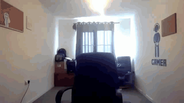 a room with the word gamer on the wall