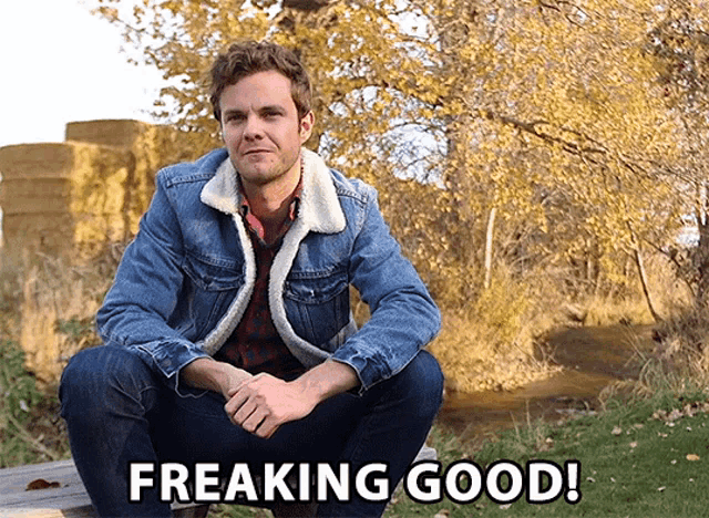a man in a denim jacket is sitting on a bench with the words freaking good written below him