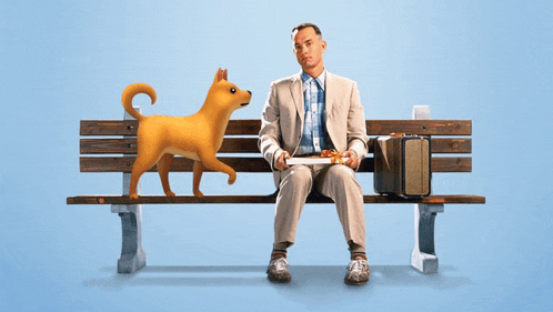 a man is sitting on a bench with a dog standing next to him