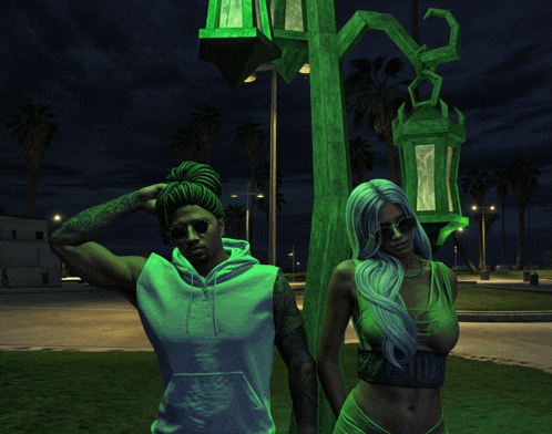 a man and a woman are standing next to each other under a green lantern