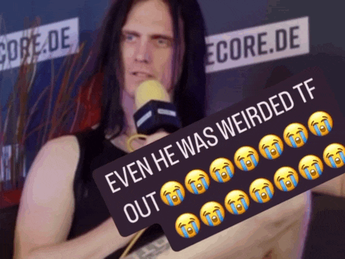 a man holding a microphone behind a sign that says even he was weirded tf