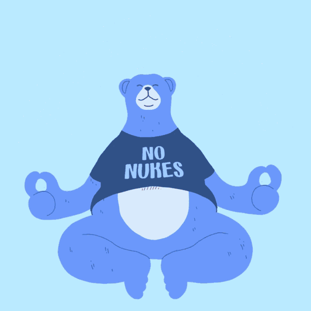 a blue bear wearing a shirt that says no nukes