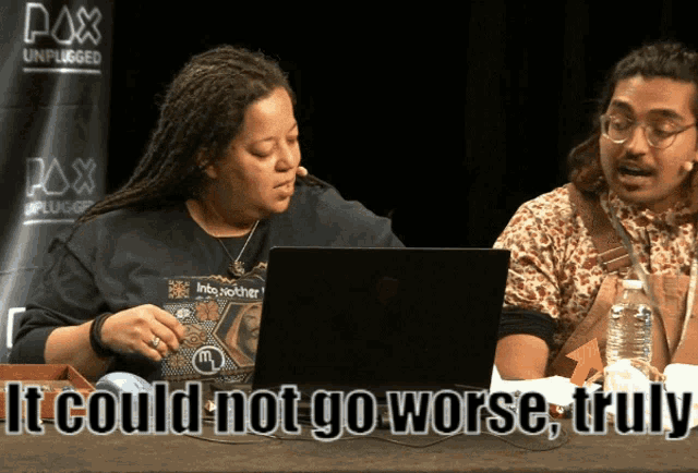 a woman sitting in front of a laptop with the words " it could not go worse truly " below her