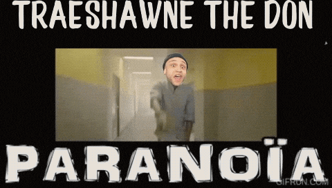 a man in a black hat is standing in a hallway with the words paranoia below him