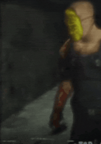a blurred image of a person in a dark room with the letters sdr on the bottom right