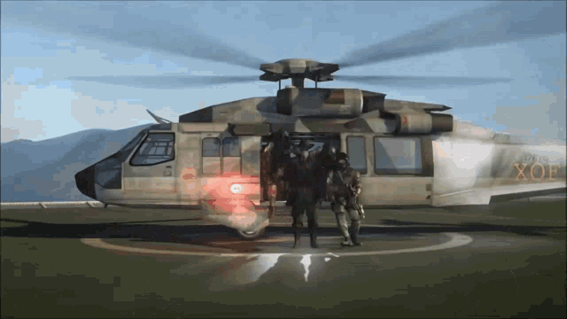 a military helicopter has the word xof on the side