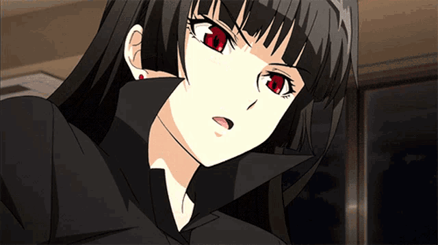 a close up of a girl with red eyes