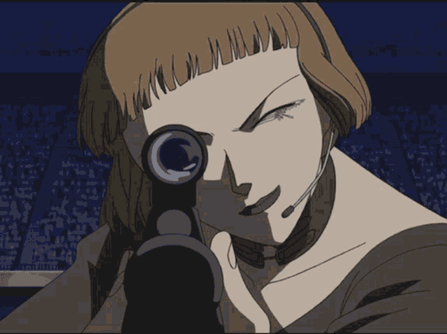 a woman wearing a headset is holding a gun in her hand