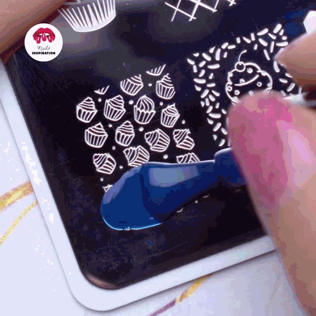 a person is using a stencil with cupcakes and sprinkles on it and the stencil says kylie inspiration